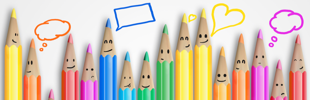 Group of smiling pencils with social chat sign
